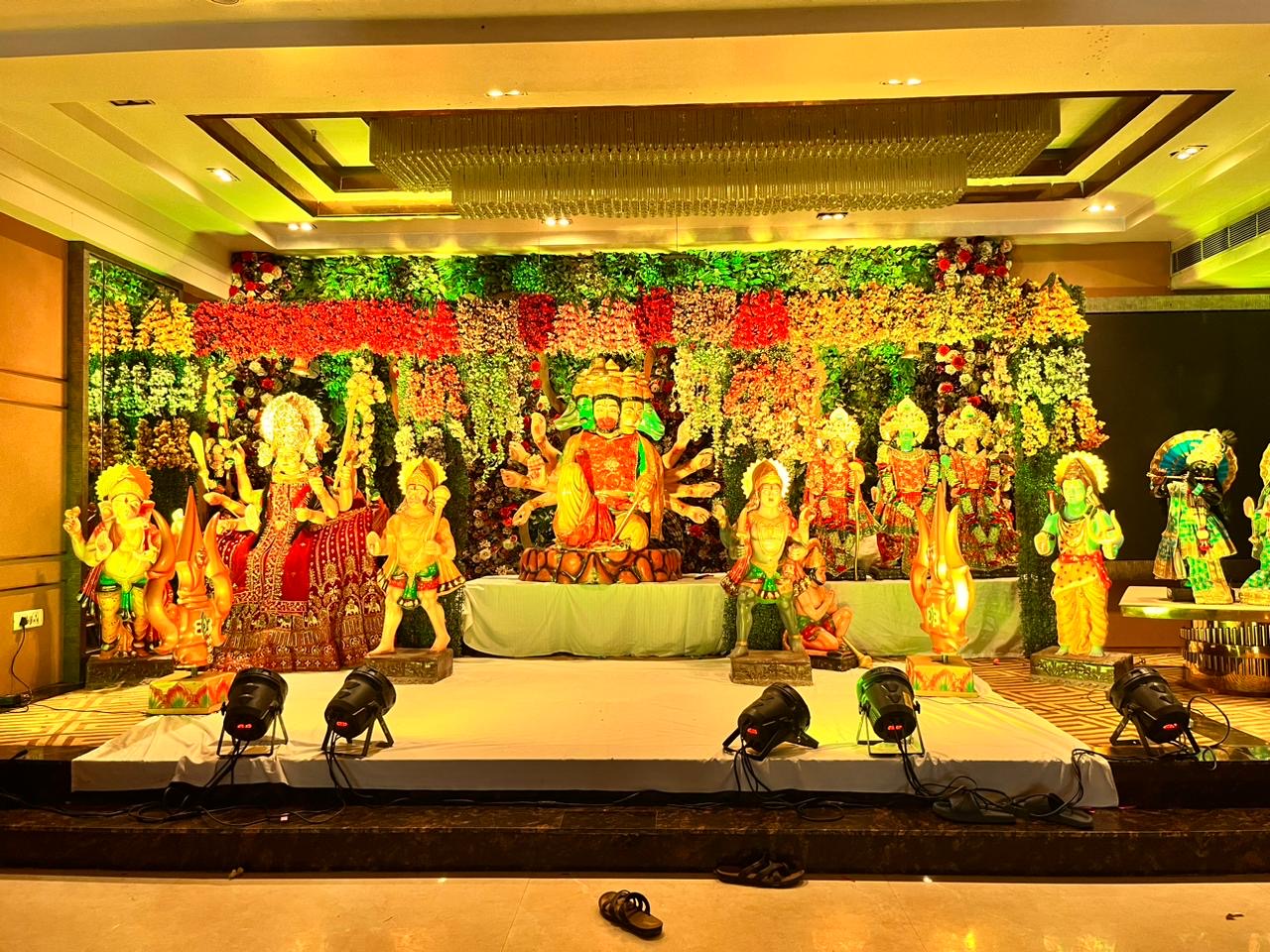 Bright Mata Darbar stage with golden lighting